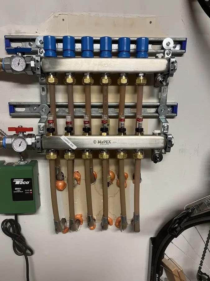 Plumber performing Leak Detection at a residential property in Ayer